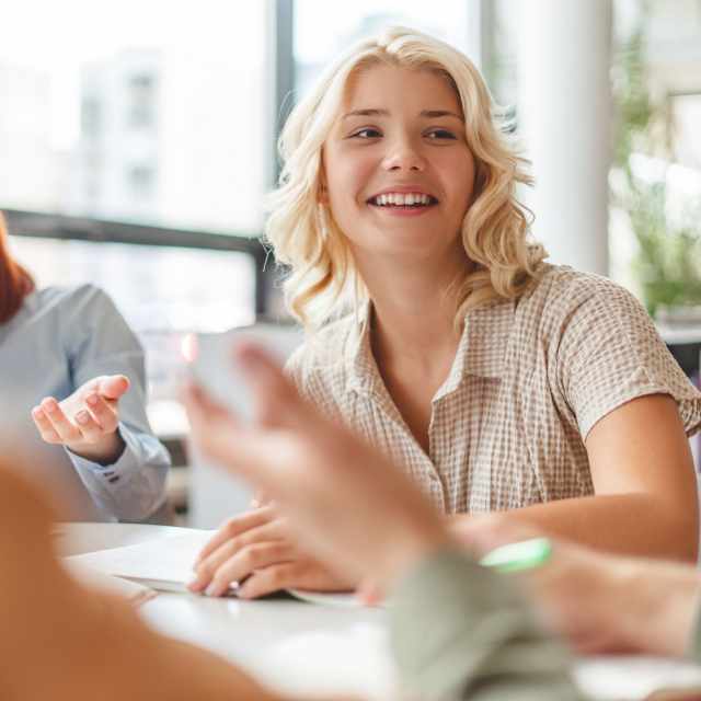 Student smiling in classroom